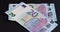 put euro banknotes of the European Union on black paper