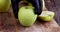 put a green apple in the peel on a board during cooking