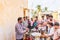 PUTTAPARTHI, ANDHRA PRADESH, INDIA - JULY 9, 2017: A group of people in line for a meal. Copy space for text.