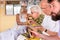 PUTTAPARTHI, ANDHRA PRADESH, INDIA - JULY 9, 2017: People in ayurvedic restaurant. Close-up.