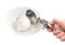 putting ball of ice cream in bowl by disher scoop