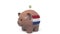 Putting money into piggy bank with flag of the Netherlands. Tax system system or savings related conceptual 3D animation