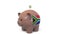 Putting money into piggy bank with flag of South Africa. Tax system system or savings related conceptual 3D animation