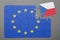 Puzzle with flag of european union and czech republic piece detached.