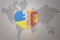 Puzzle heart with the national flag of ukraine and sri lanka on a world map background. Concept