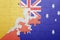 Puzzle with the national flag of bhutan and australia