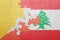 puzzle with the national flag of bhutan and lebanon