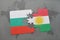 puzzle with the national flag of bulgaria and kurdistan on a world map