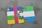 puzzle with the national flag of central african republic and sierra leone on a world map