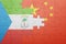 Puzzle with the national flag of china and equatorial guinea