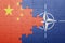 Puzzle with the national flag of china and nato