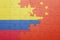 Puzzle with the national flag of colombia and china