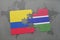 puzzle with the national flag of colombia and gambia on a world map