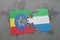 puzzle with the national flag of ethiopia and sierra leone on a world map