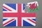 Puzzle with national flag of great britain and wales piece detached.