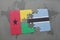 puzzle with the national flag of guinea bissau and botswana on a world map