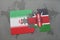 puzzle with the national flag of iran and kenya on a world map background.