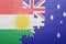Puzzle with the national flag of kurdistan and australia