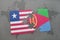 puzzle with the national flag of liberia and eritrea on a world map