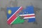 puzzle with the national flag of namibia and cape verde on a world map