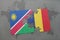 puzzle with the national flag of namibia and chad on a world map