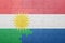 Puzzle with the national flag of netherlands and kurdistan