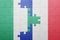 puzzle with the national flag of nigeria and france