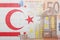 Puzzle with the national flag of northern cyprus and euro banknote