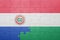 puzzle with the national flag of paraguay and hungary