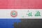 puzzle with the national flag of paraguay and iraq