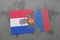 puzzle with the national flag of paraguay and mongolia on a world map