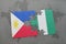 puzzle with the national flag of philippines and nigeria on a world map