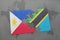 puzzle with the national flag of philippines and tanzania on a world map