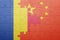 Puzzle with the national flag of romania and china