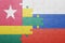 puzzle with the national flag of russia and togo