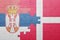 Puzzle with the national flag of serbia and denmark