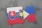 puzzle with the national flag of slovakia and philippines on a world map