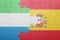 puzzle with the national flag of spain and sierra leone