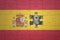 puzzle with the national flag of spain and usa dollar banknote. finance concept