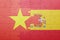 Puzzle with the national flag of spain and vietnam