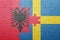 Puzzle with the national flag of sweden and albania