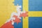 puzzle with the national flag of sweden and bhutan