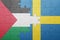 puzzle with the national flag of sweden and palestine