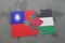 puzzle with the national flag of taiwan and palestine on a world map background.