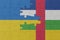 puzzle with the national flag of ukraine and central african republic . macro.concept