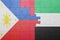 Puzzle with the national flag of united arab emirates and philippines