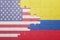 Puzzle with the national flag of united states of america and colombia