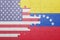 Puzzle with the national flag of united states of america and venezuela