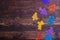 Puzzle pieces on wooden background, top view, flat lay. Autism Spectrum Disorder ASD. Autism awareness. Concept of autism word