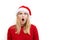 Puzzled confused bewildered shocked amazed woman in santa claus hat . Comical reaction, emotion facial expression and